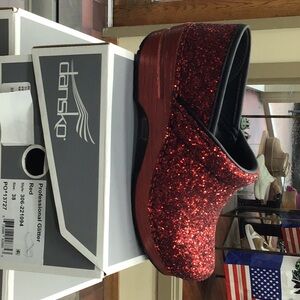 Dansko Stapled Clog Professional in red glitter